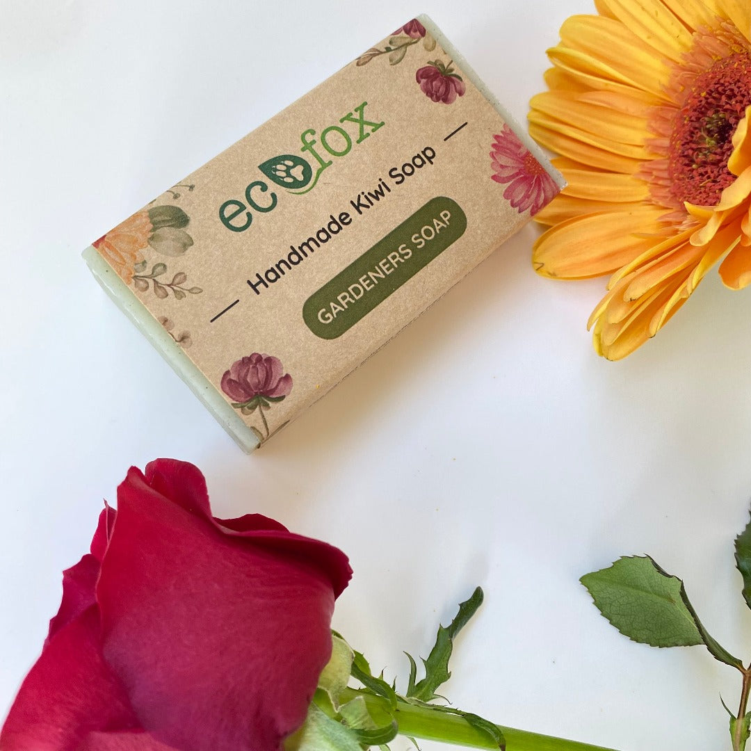 Close-up of our gardener's soap showcasing its soothing green hue, reminiscent of the calming colors found in a garden. Crafted with finely ground pumice from NZ volcanic rocks for natural exfoliation, and sand for effective removal of surface dirt.