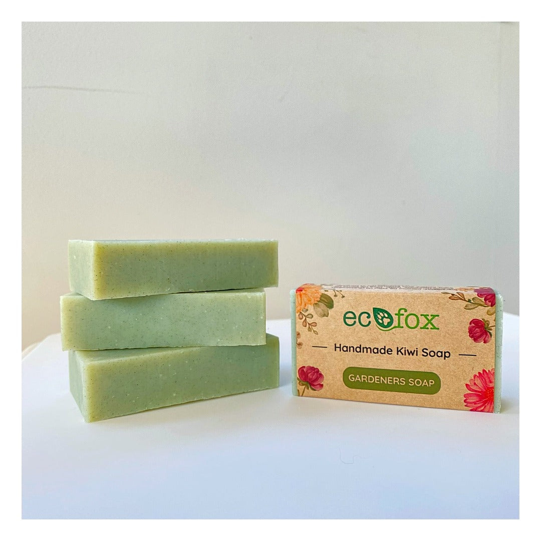 Close-up of our gardener's soap showcasing its soothing green hue, reminiscent of the calming colors found in a garden. Crafted with finely ground pumice from NZ volcanic rocks for natural exfoliation, and sand for effective removal of surface dirt.
