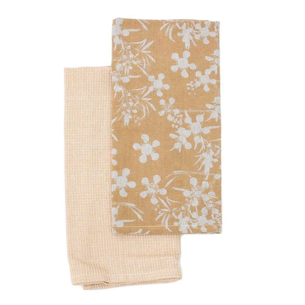 A set of 2 beautiful tea towels, each screen printed with a hand drawn myrtle design.