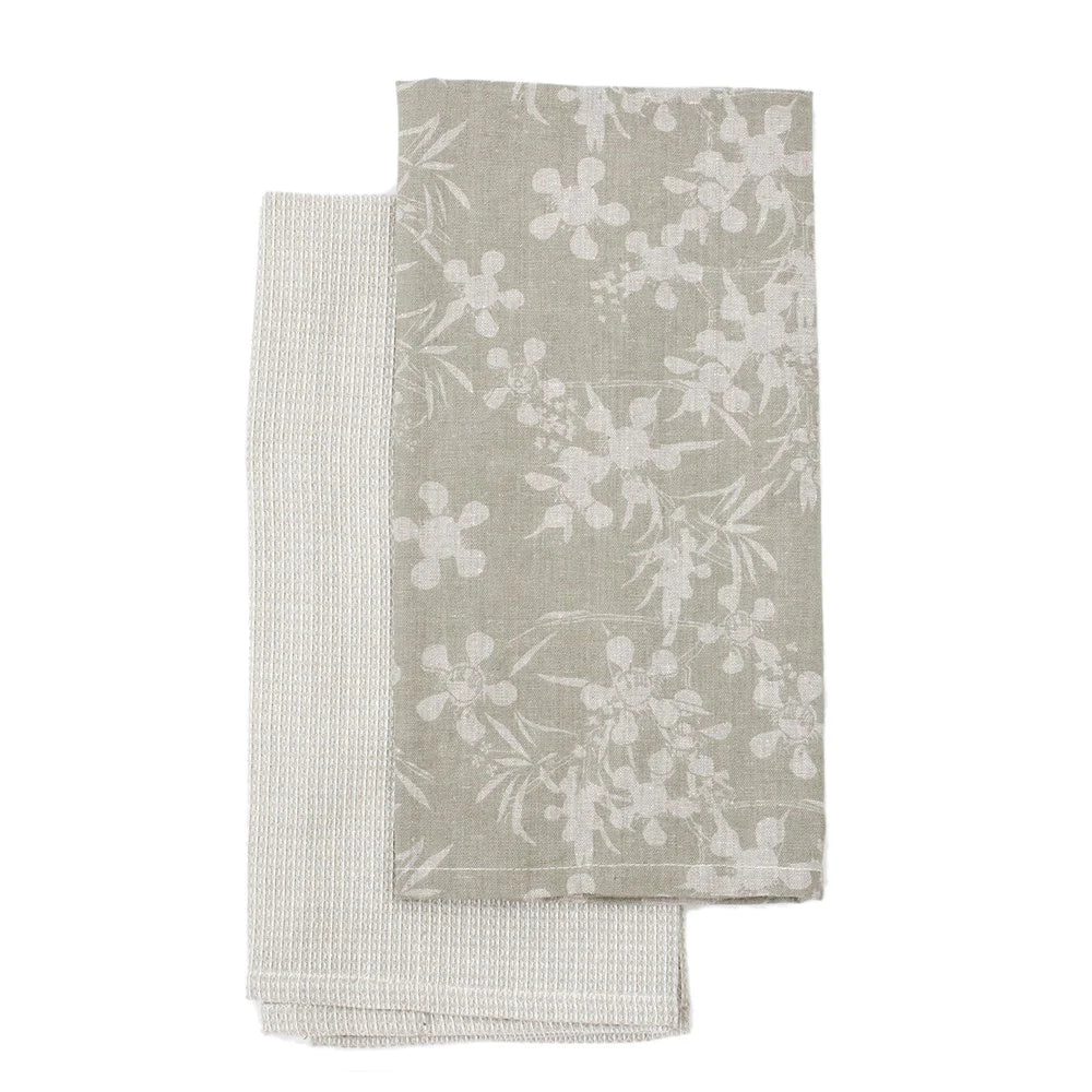 A set of 2 beautiful tea towels, each screen printed with a hand drawn myrtle design.
