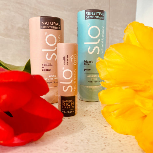 Velvet Vanilla Trio: Vanilla + Cacao Moisturiser, Sensitive Vanilla Deodorant, and Vanilla + Cacao Lip Balm arranged together.