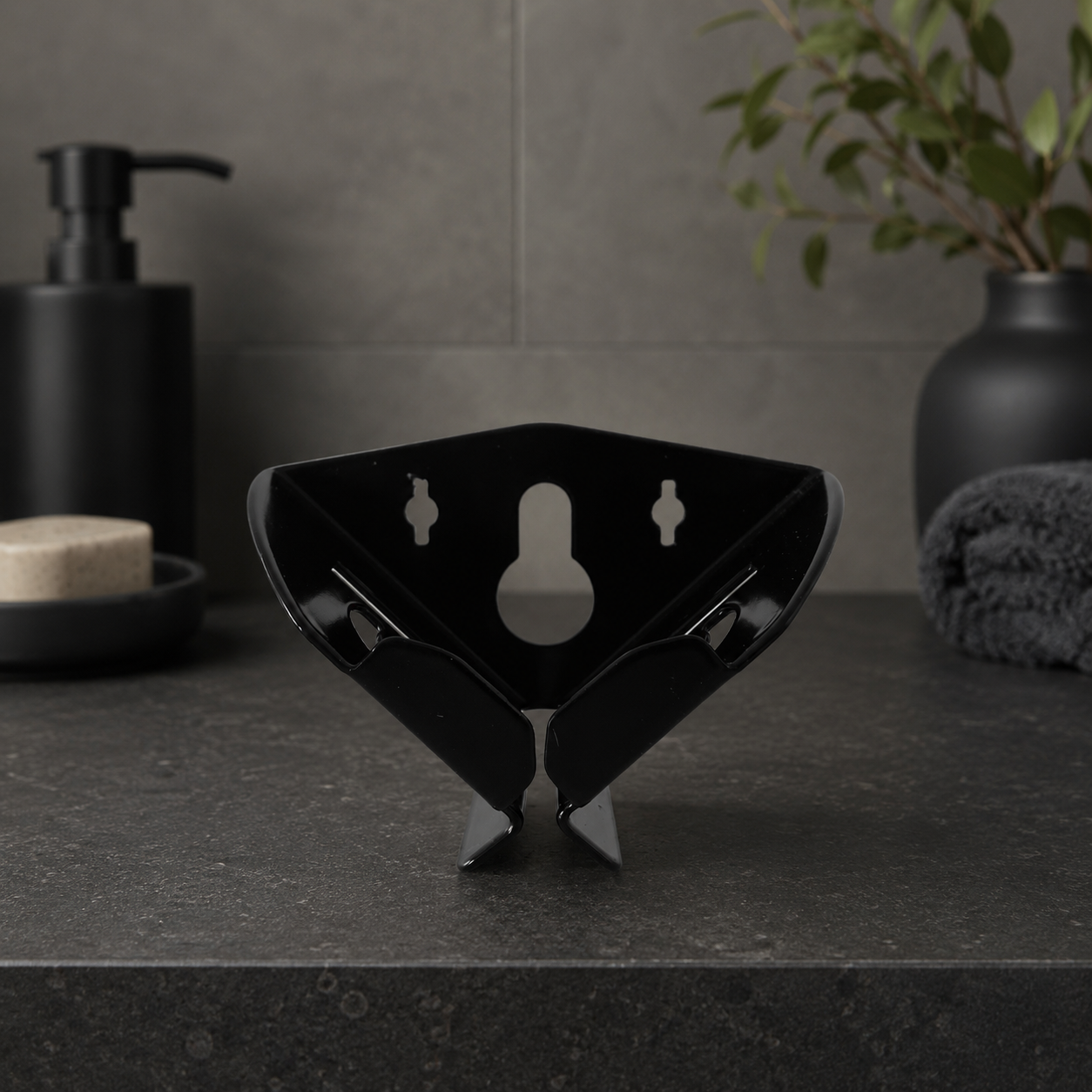 Black Block Dock wall-mounted soap holder in a modern bathroom setting, designed to keep natural soap bars dry and extend their life.