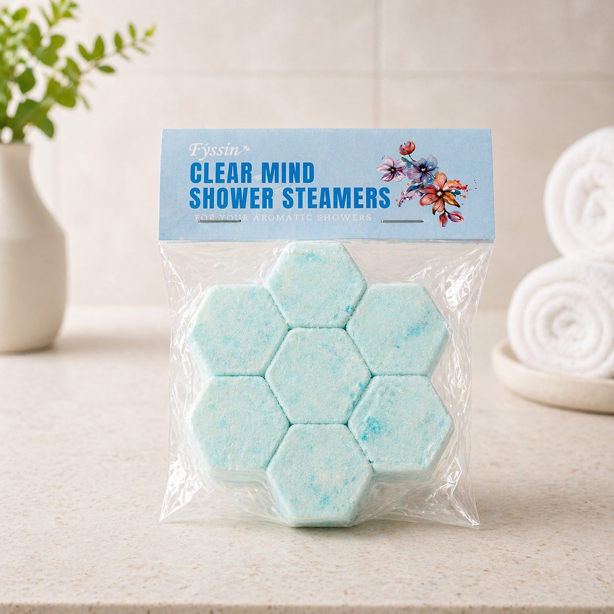 Clear mind shower steamers in a fresh and calming spa-style background