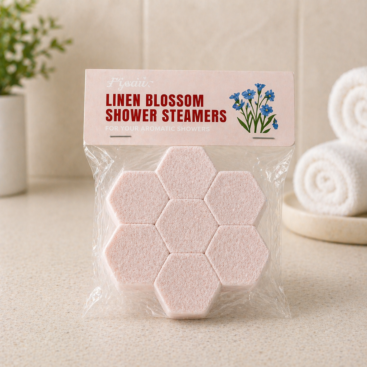 Linen blossom shower steamers in a clean minimalist spa environment