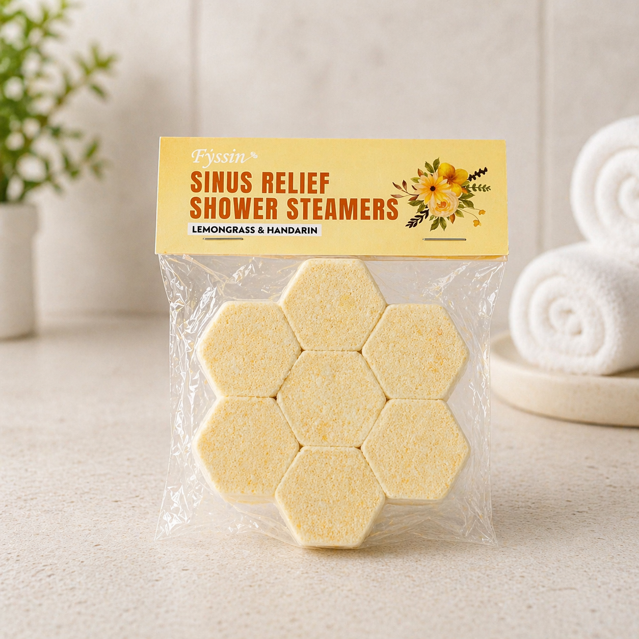 Natural sinus relief shower steamers with lemongrass and mandarin in a soft spa setting
