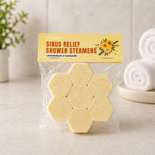 Natural sinus relief shower steamers with lemongrass and mandarin in a soft spa setting