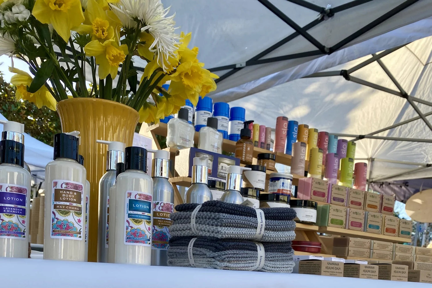 Eco-friendly handmade soap bars and sustainable homewares displayed in a natural setting, showcasing eco-conscious craftsmanship and environmentally friendly living.
