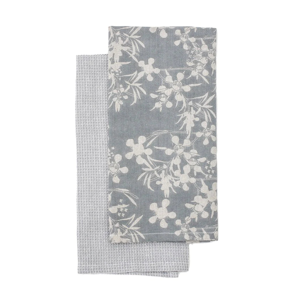 A set of 2 beautiful tea towels, each screen printed with a hand drawn myrtle design.