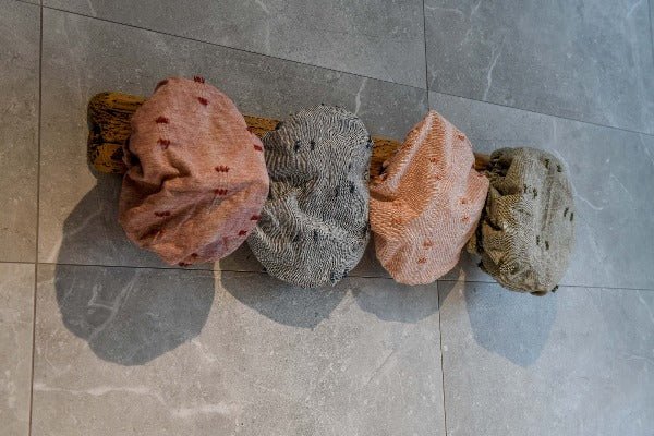 Modern, eco-friendly fitted shower cap made from recycled cotton blend, stylish for the shower or swimming pool.