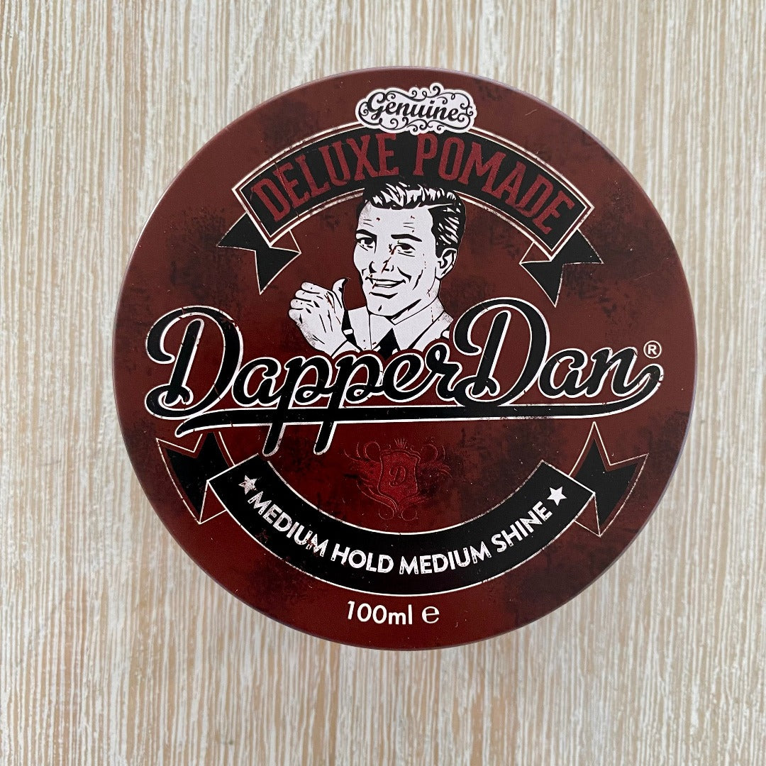 Dapper Dan's hair styling products featuring Deluxe Pomade
